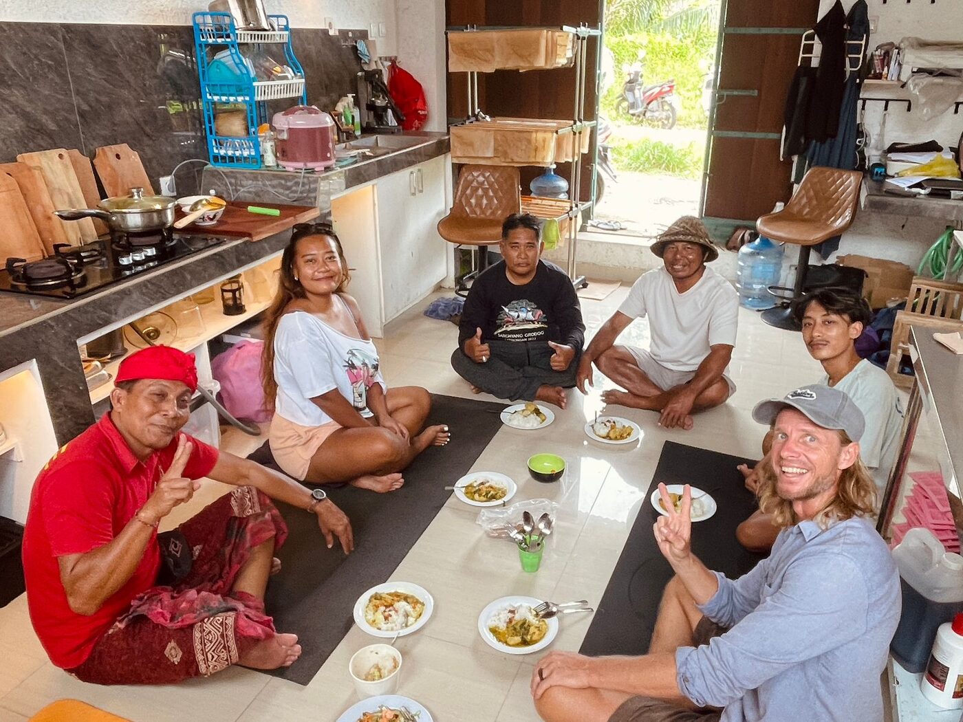 New Blue team sharing lunch with seaweed farmers