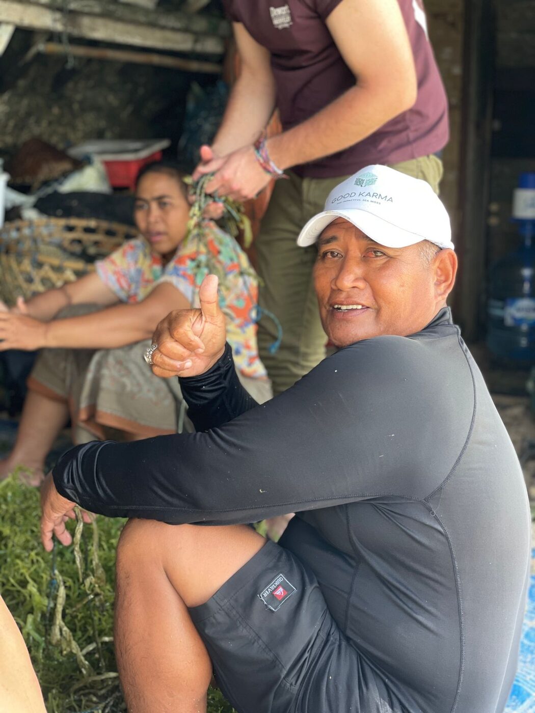 Local seaweed farmer in Nusa Lembongan giving a thumbs up