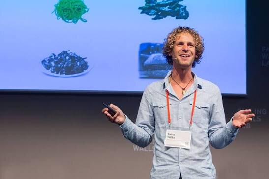 Toine Wilke speaking at a seaweed conference